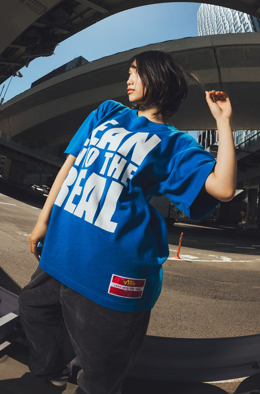 "LEAN INTO THE REAL" TEE BLUE