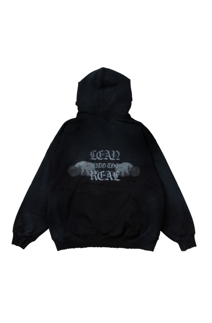 【予約】”LEAN INTO THE REAL” PULLOVER HOODIE BLACK