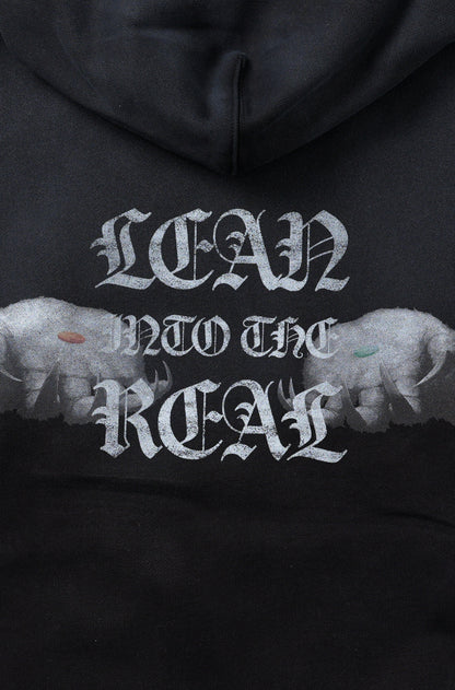 【予約】”LEAN INTO THE REAL” PULLOVER HOODIE BLACK